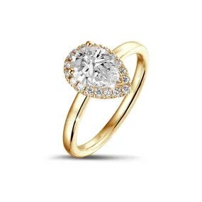 0.70 quilates anillo aureola en oro amarillo con diamante en forma de pera 